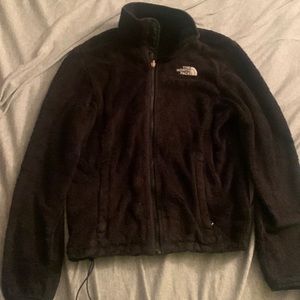 Black fuzzy North Face jacket